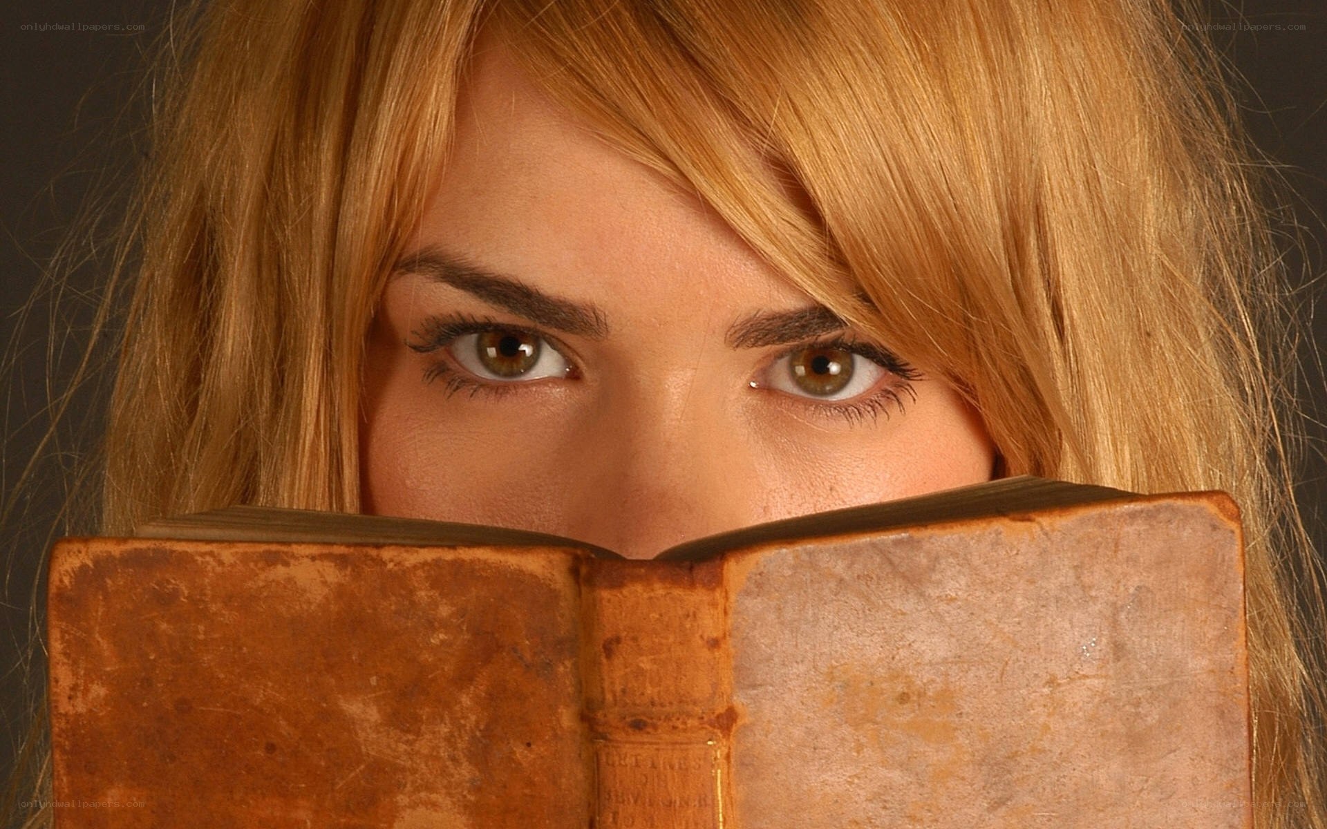 woman reading old book