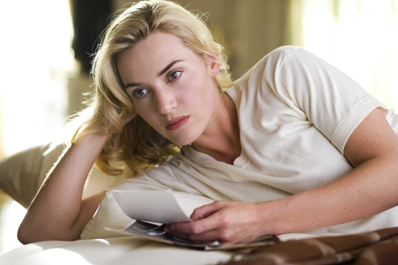 Woman reading on a bed