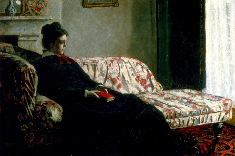Woman reading on a chaise lounge