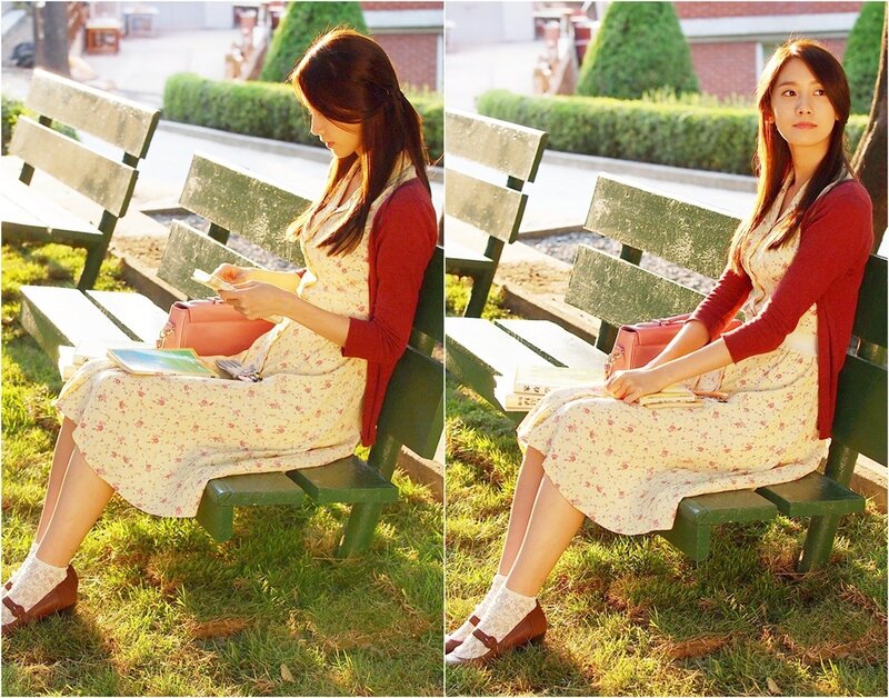 woman reading on a park bench