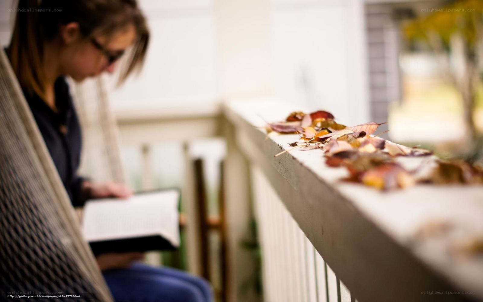 Woman reading on a porch