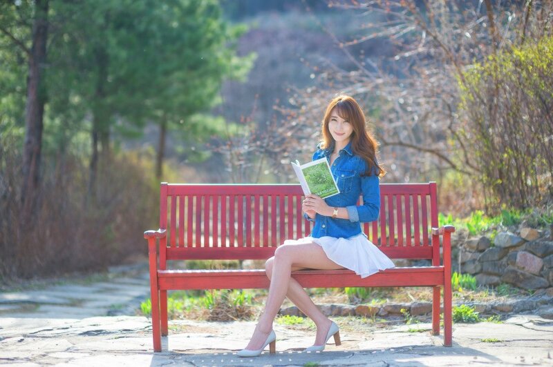 Woman Reading on Bench — Red, Serene