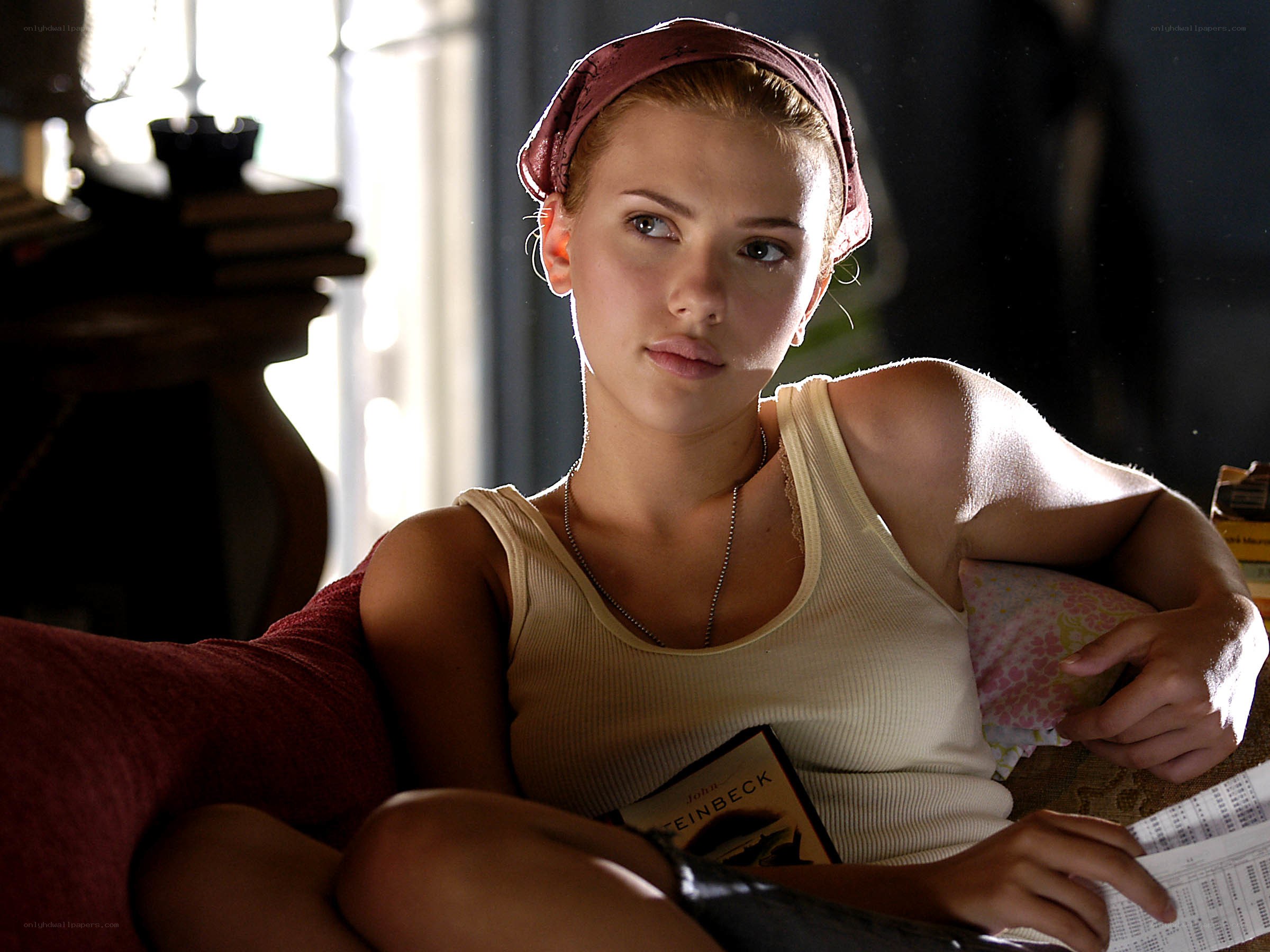 woman reading on couch