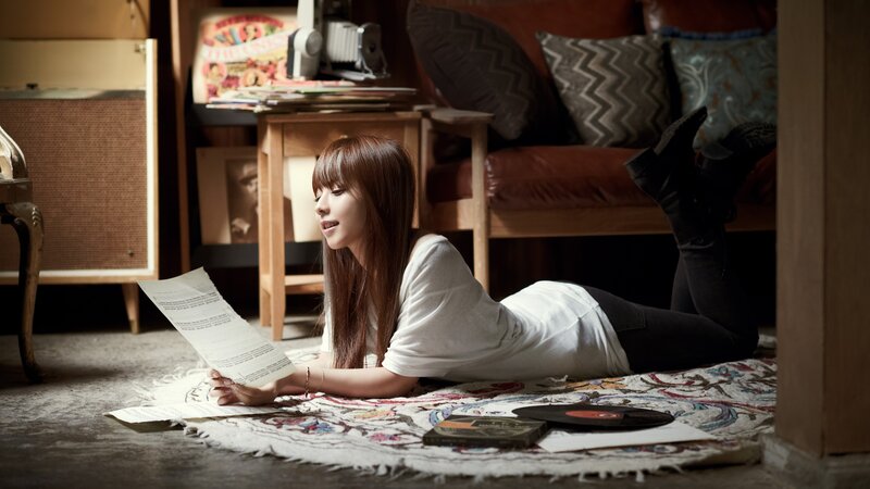 Woman Reading on Floor — Brown