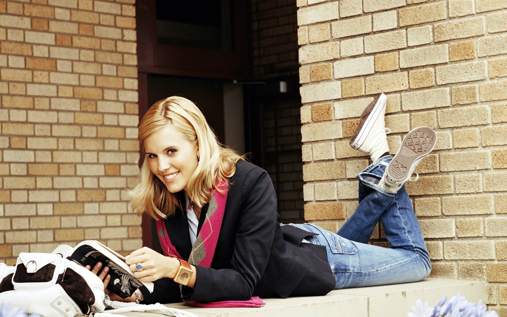 woman reading on steps