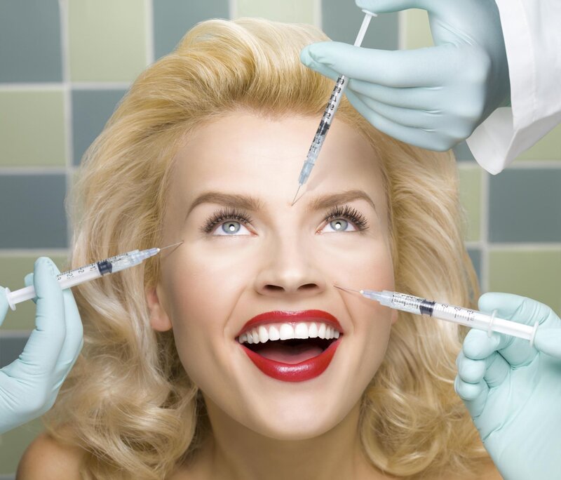 woman receiving cosmetic injections