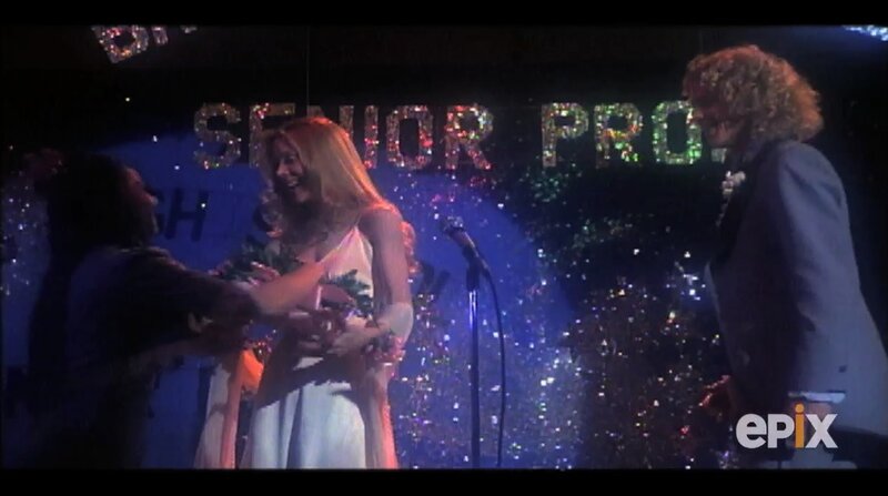 Woman Receiving Flowers on Stage