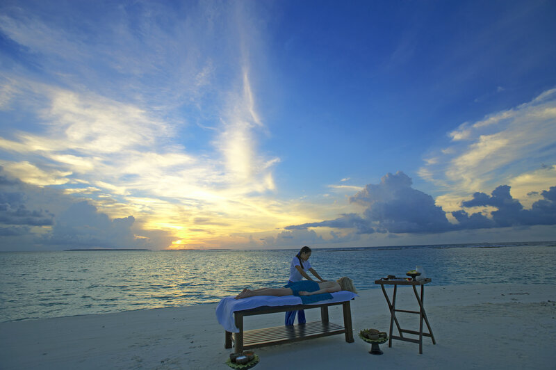 Woman Receiving Massage — Blue