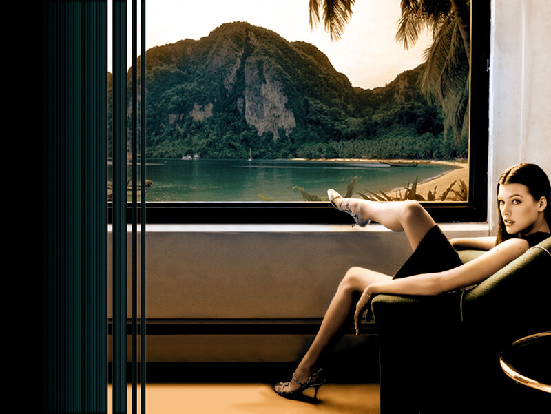 Woman relaxing by a tropical window