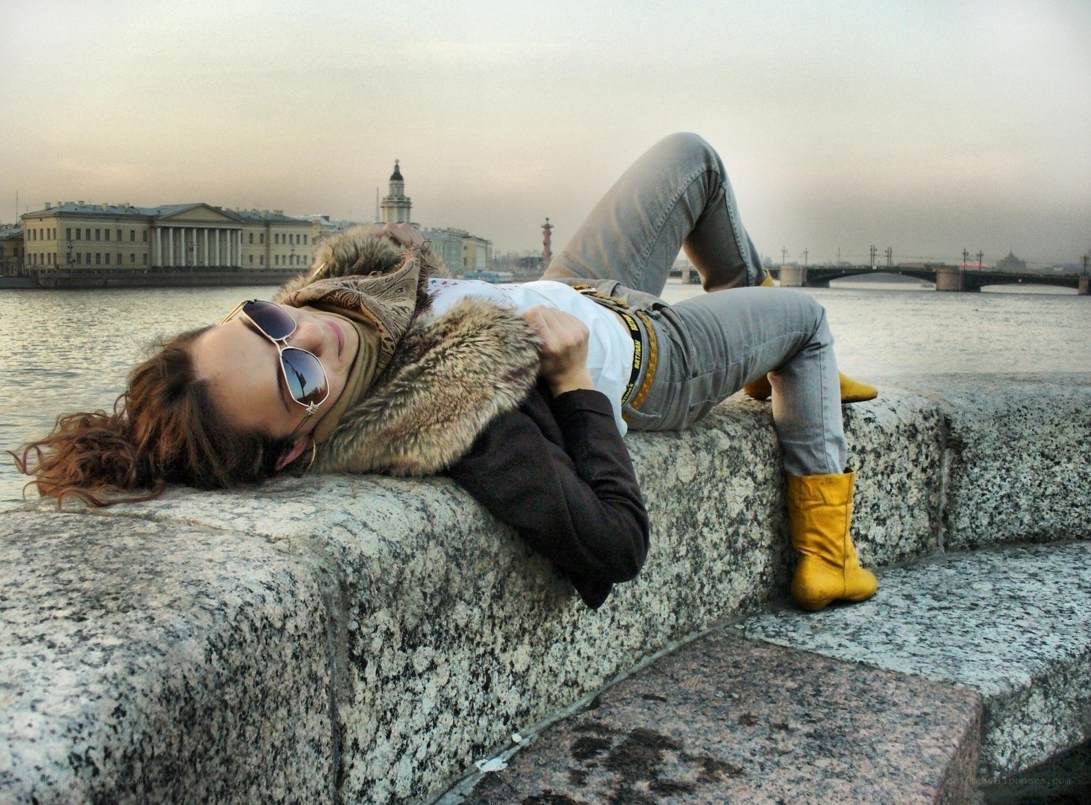 Woman relaxing by the river
