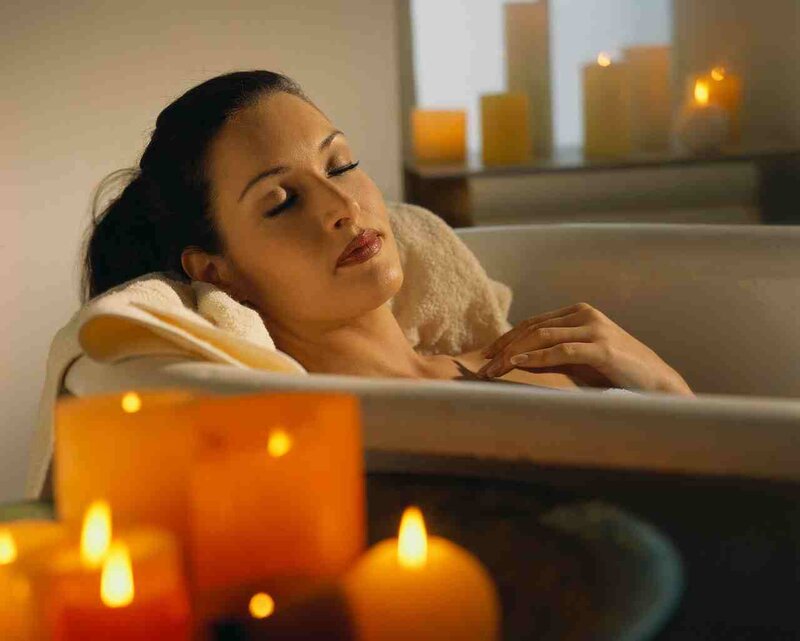 Woman relaxing in a bath