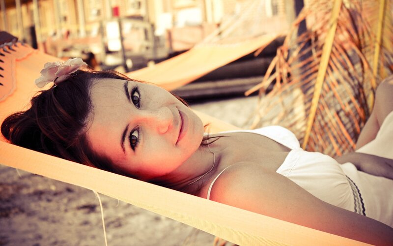 woman relaxing in a hammock