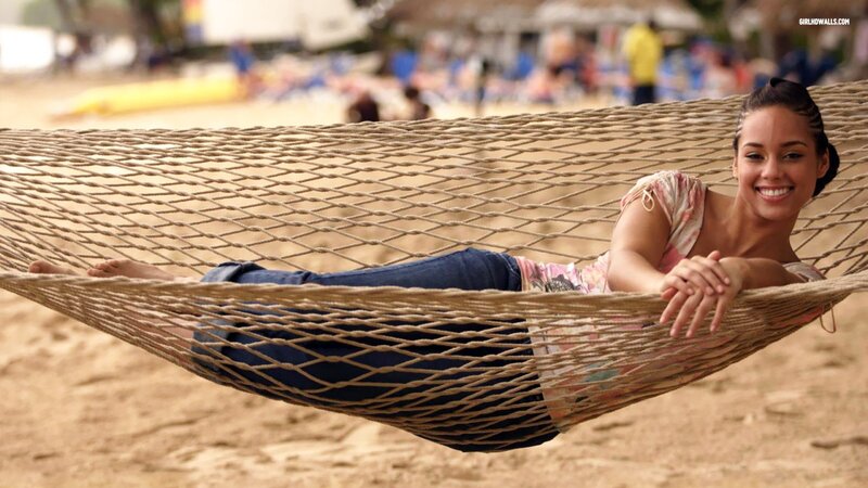 Woman relaxing in a hammock
