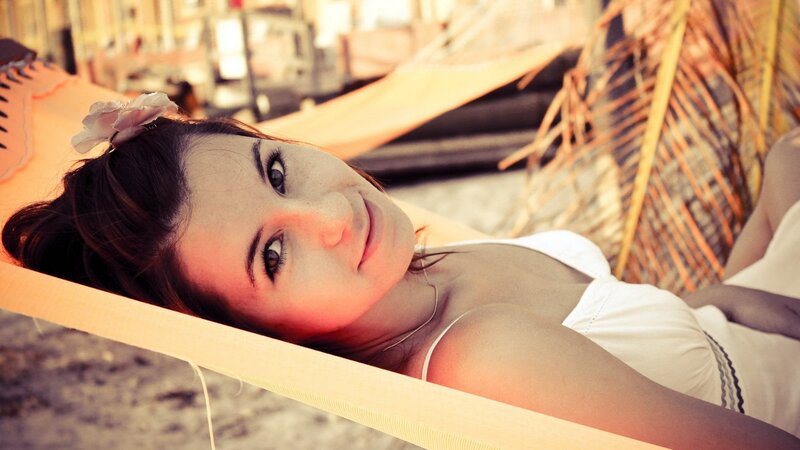 woman relaxing in hammock