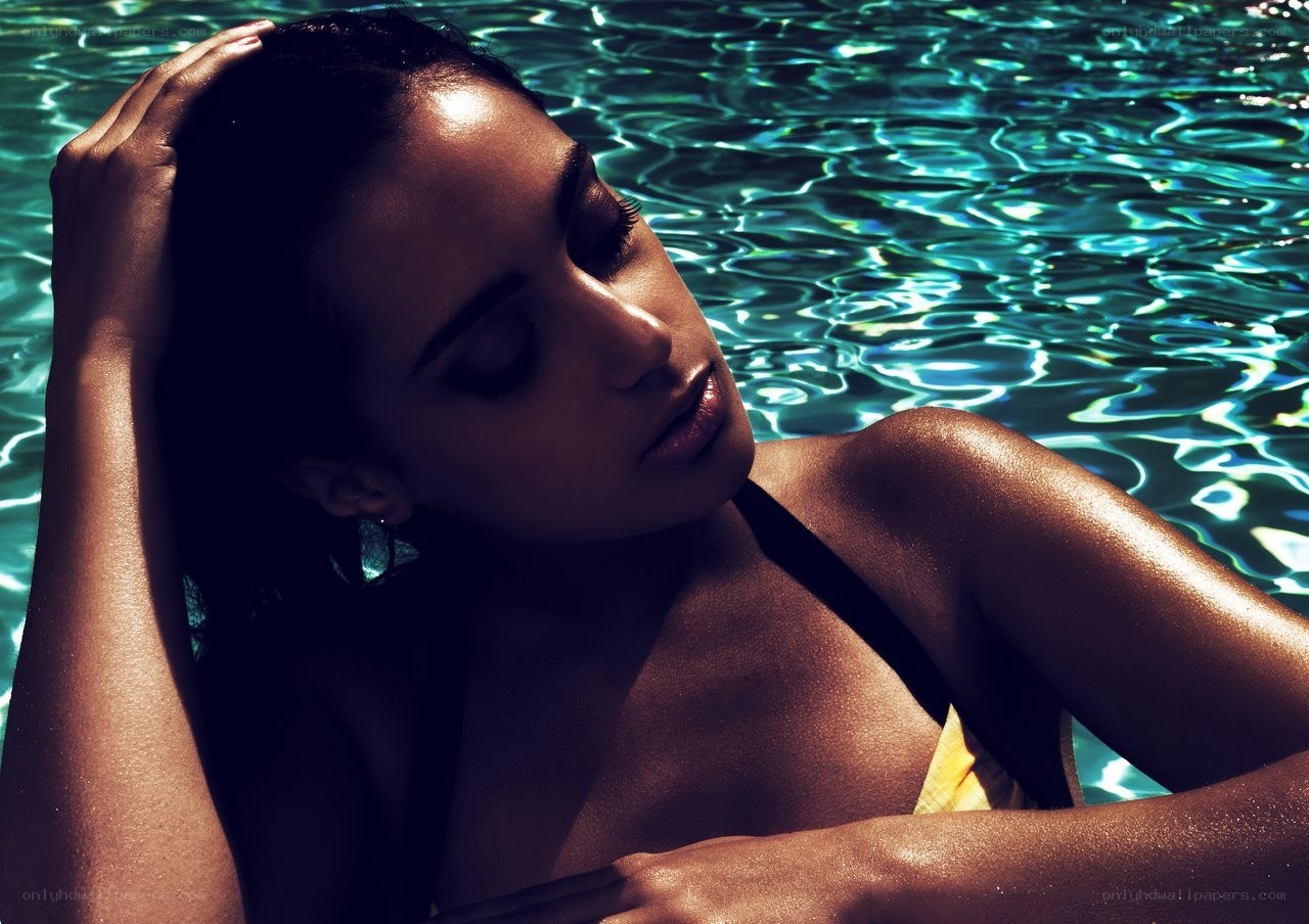 woman relaxing in pool