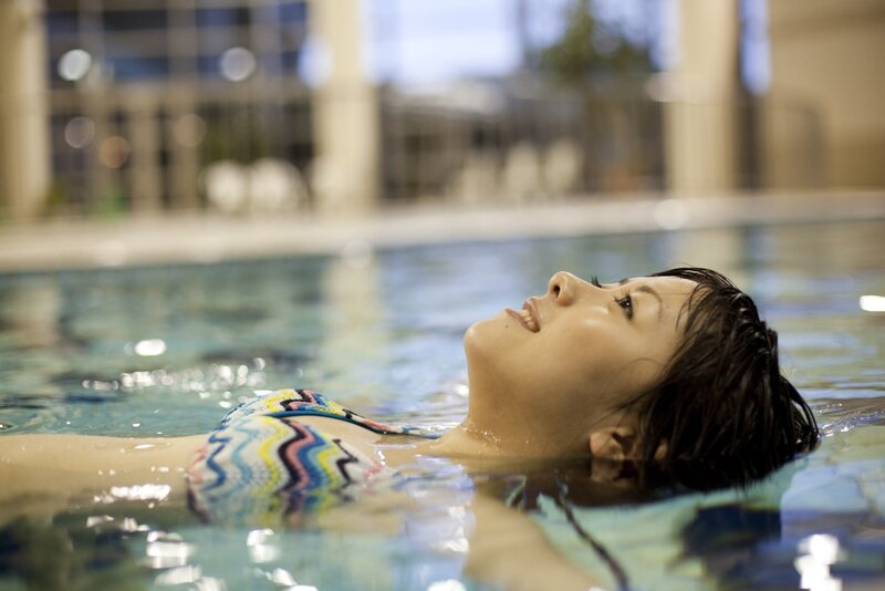 woman relaxing in pool