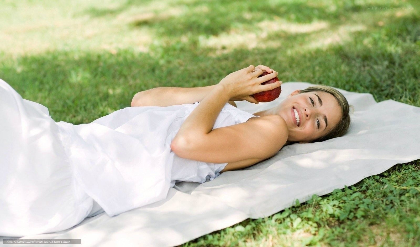 Woman relaxing on a blanket