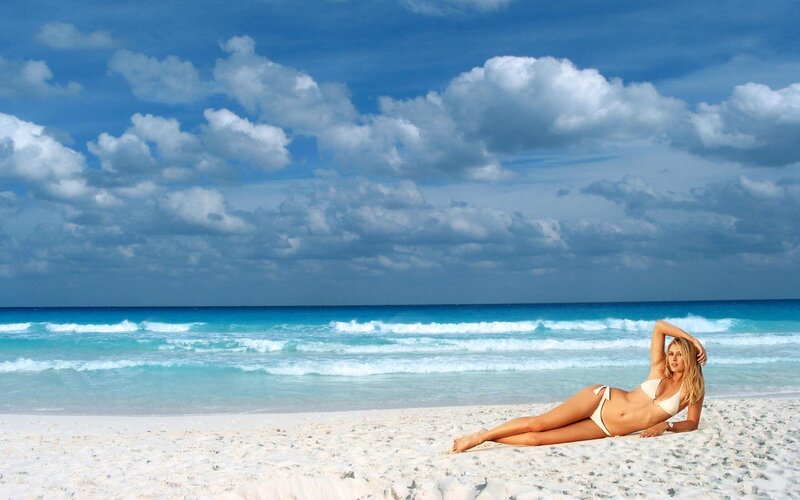 Woman relaxing on a tropical beach