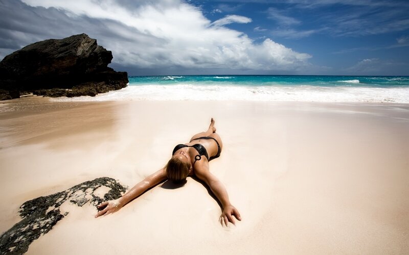 Woman relaxing on beach