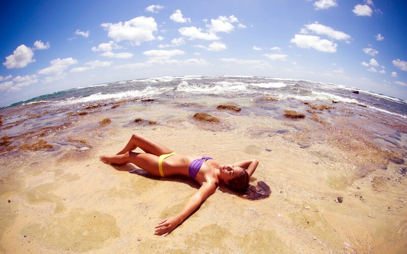 Woman relaxing on beach