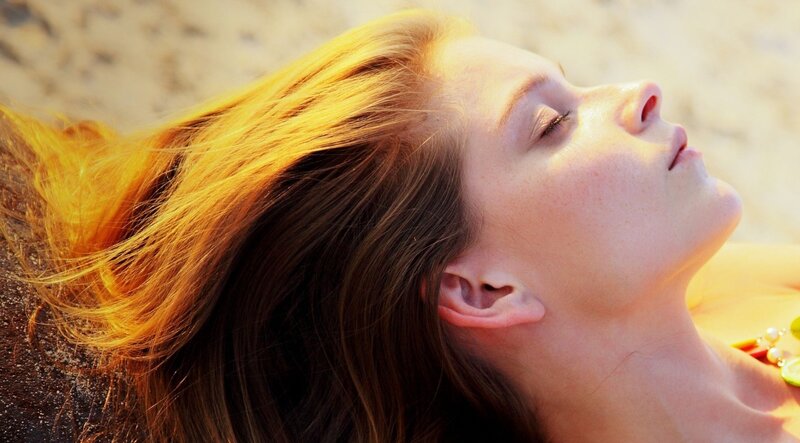 woman relaxing on beach