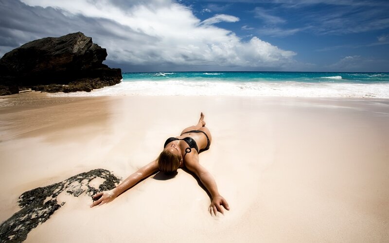Woman relaxing on beach