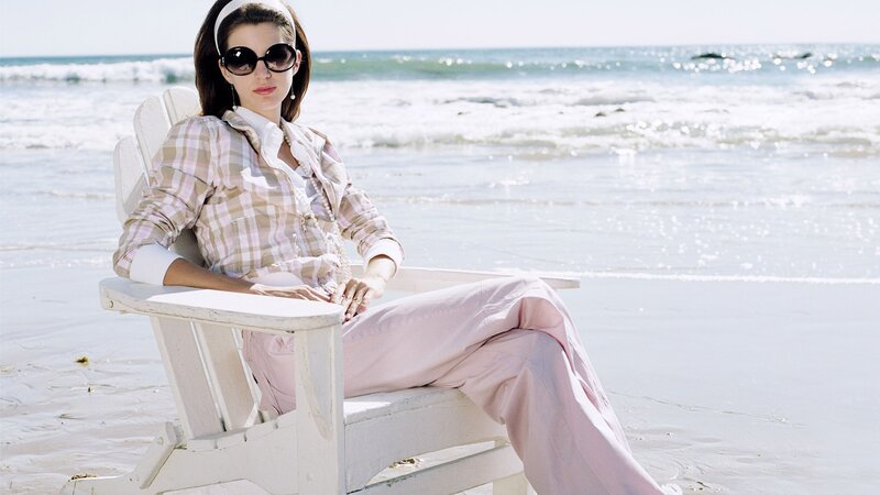 Woman relaxing on beach chair