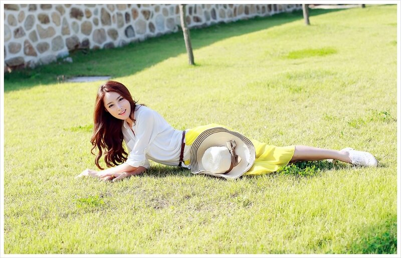 Woman relaxing on grass