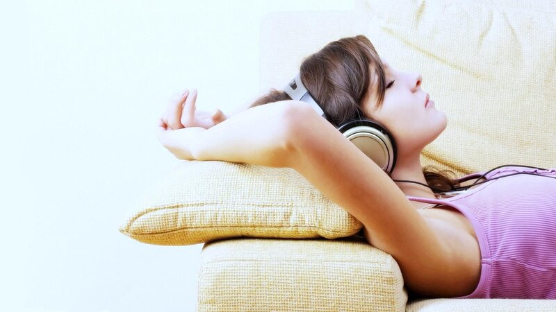 woman relaxing with headphones