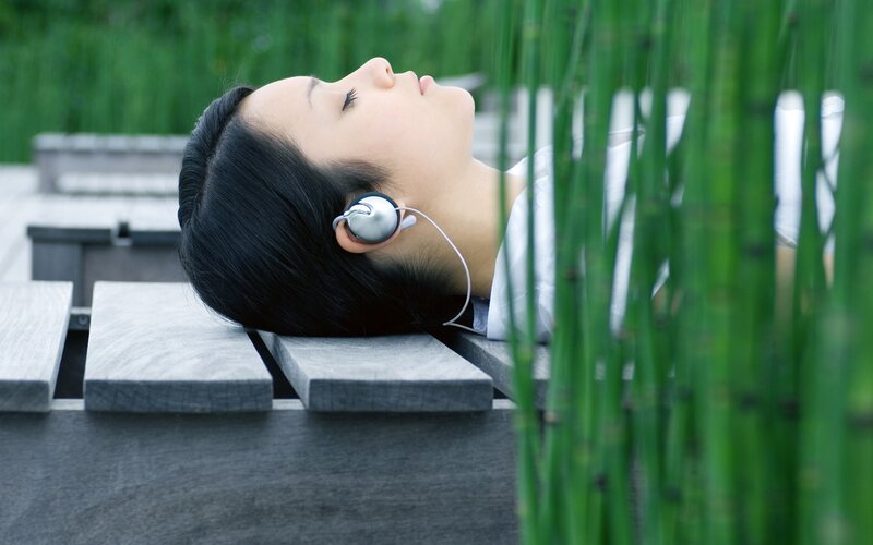 Woman relaxing with headphones
