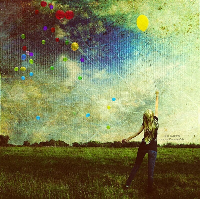 Woman Releasing Balloons