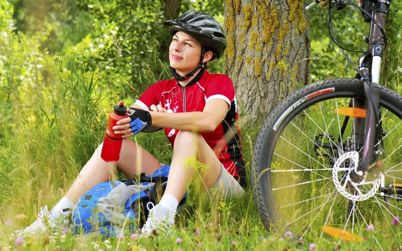 Woman resting after cycling