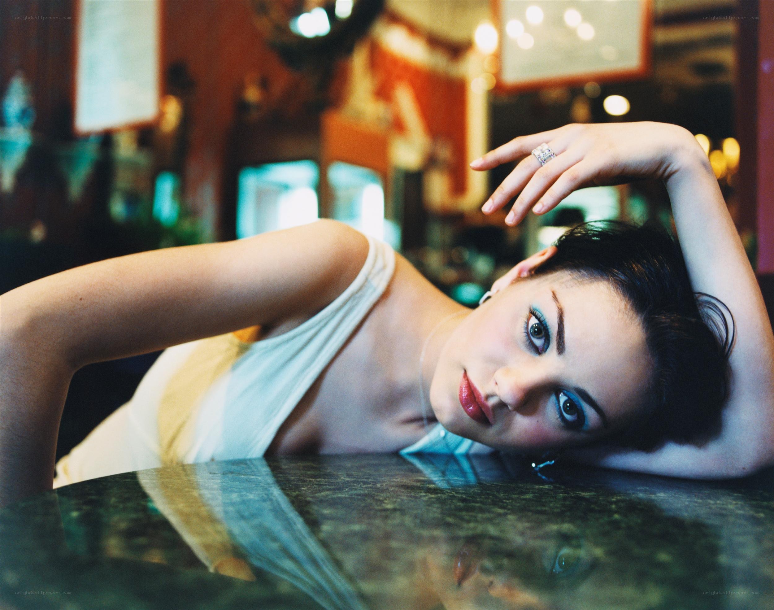 woman resting at a bar