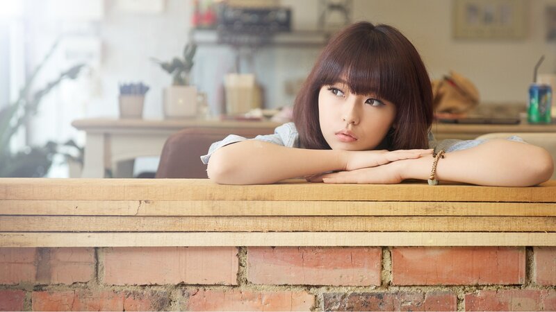 woman resting at a cafe