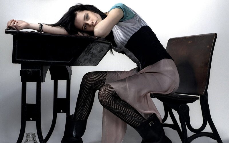 woman resting at a desk