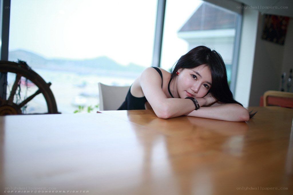 woman resting at a table
