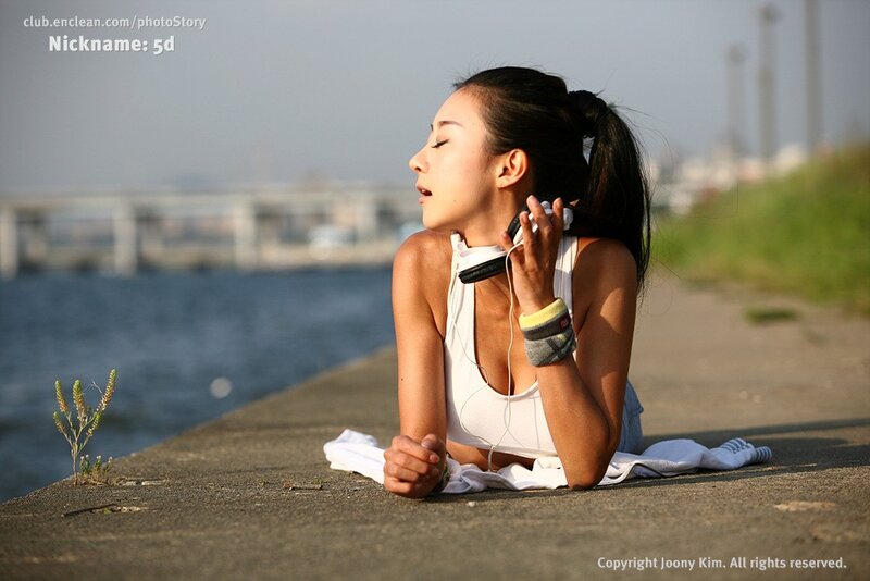 woman resting by the water