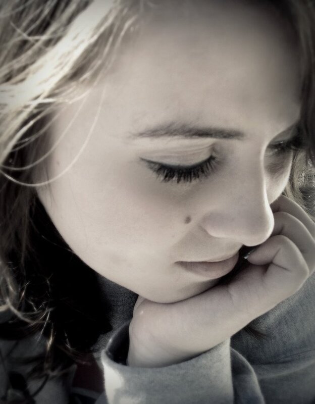 woman resting her chin