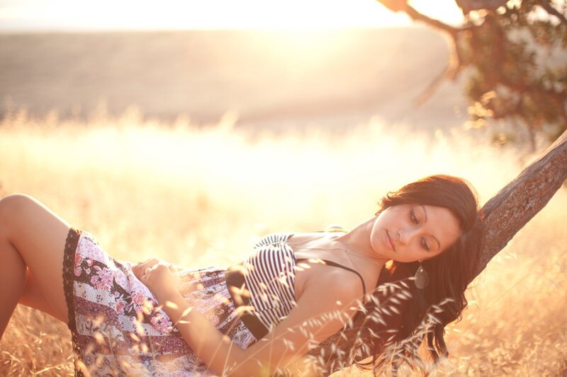 woman resting in a field