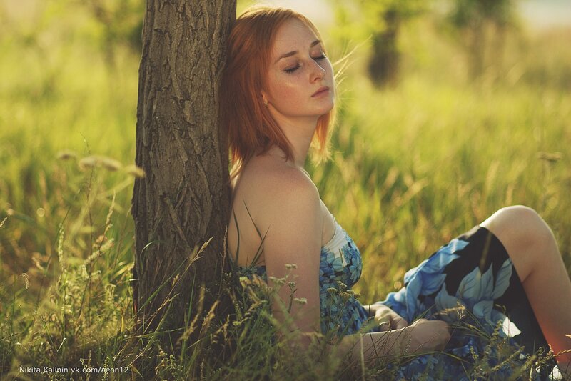 Woman resting in a field