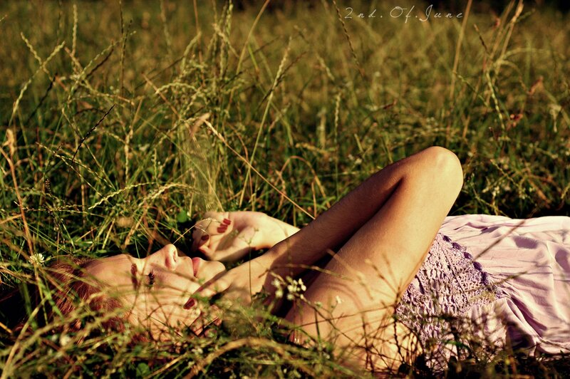 Woman resting in a field