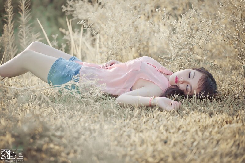 Woman resting in a field