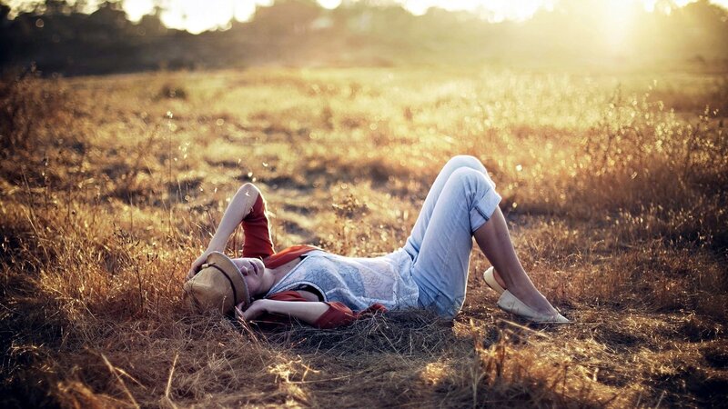 Woman resting in a field
