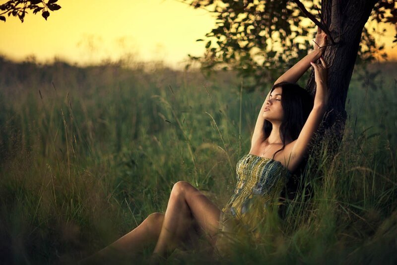Woman resting in a field