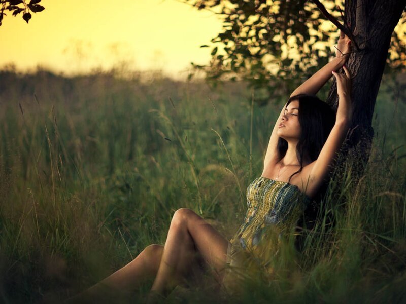 Woman resting in a field
