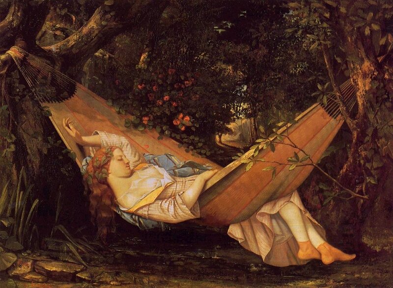 Woman resting in a hammock