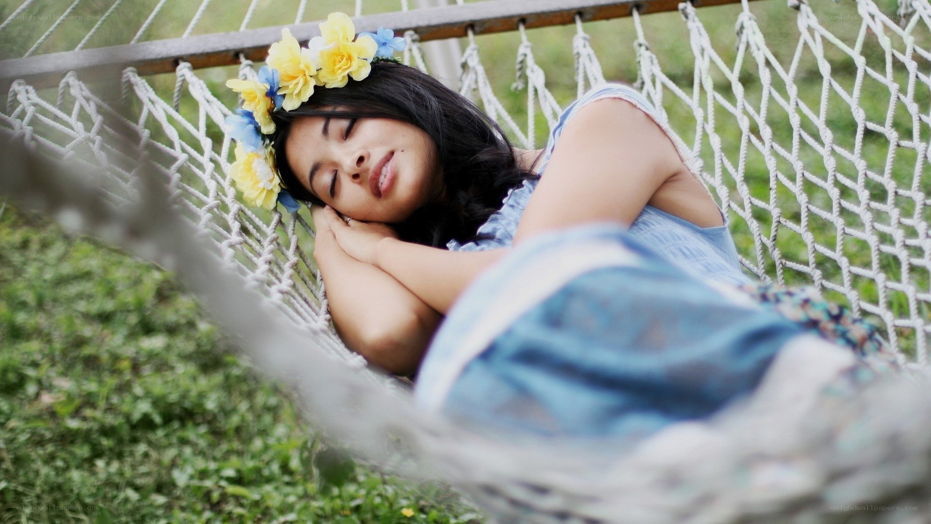 Woman resting in a hammock