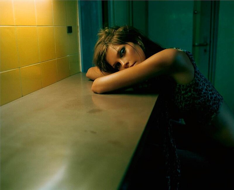 woman resting in a tiled room