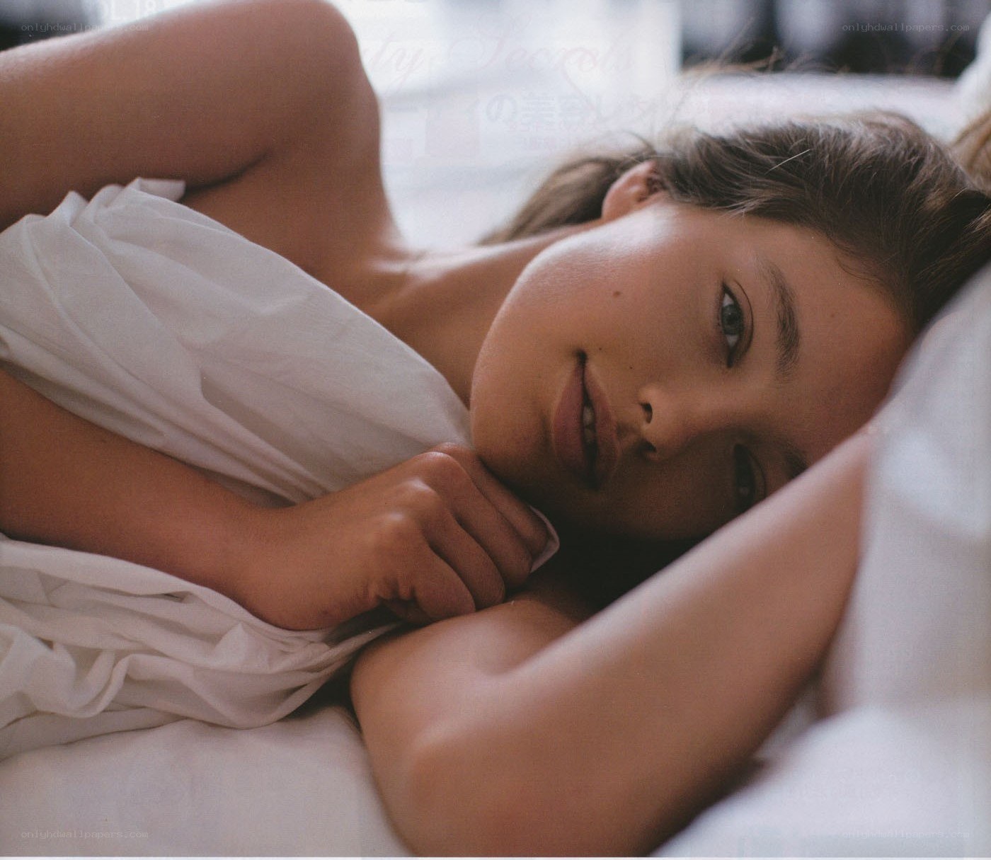 woman resting in bed