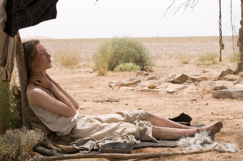 Woman Resting in Desert — Brown